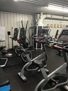 Selectorized strength machines and exercise bikes at Simple and Fit
